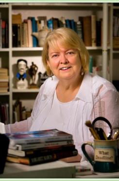Author Margaret Maron at her desk